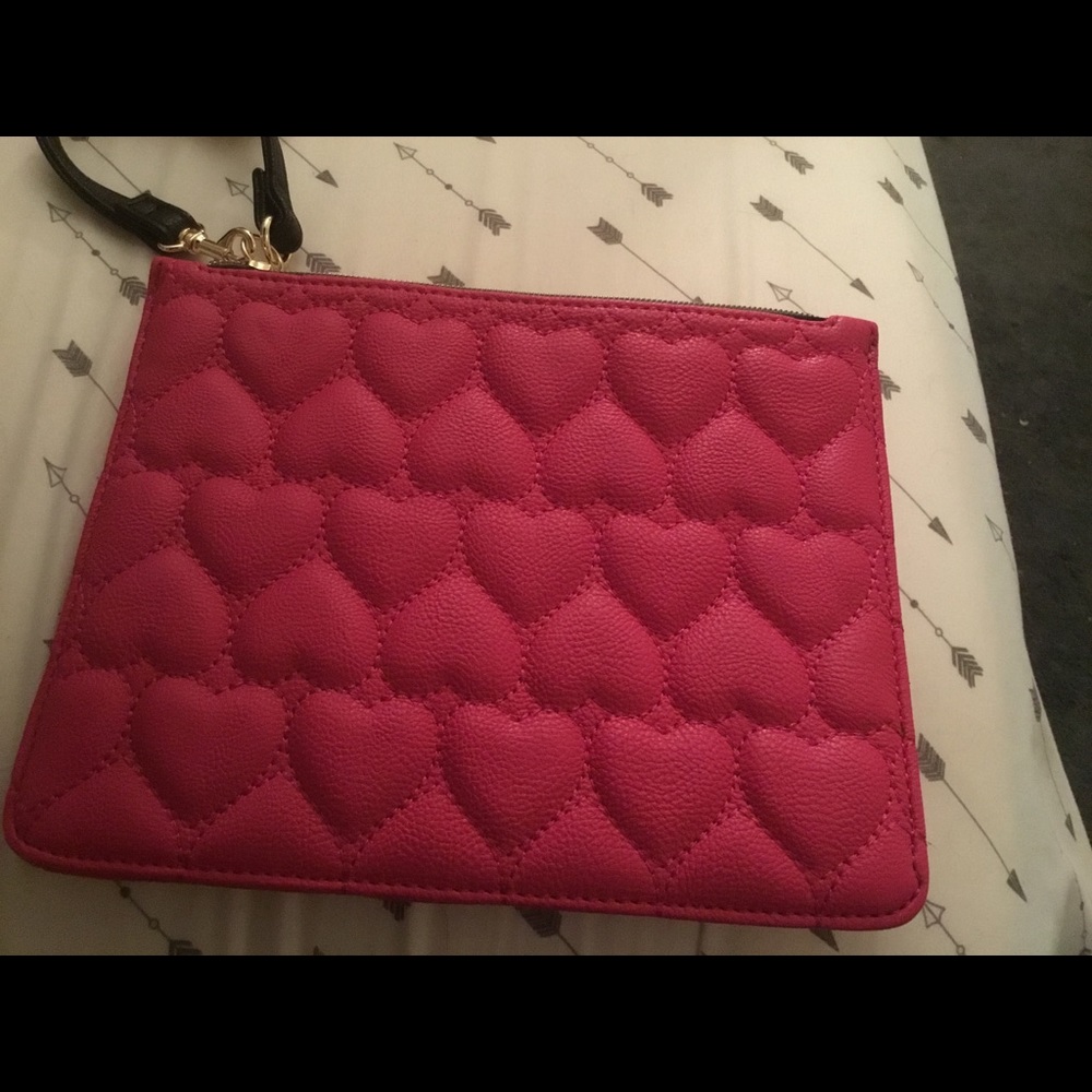 Betsy Johnson raised heart pink clutch